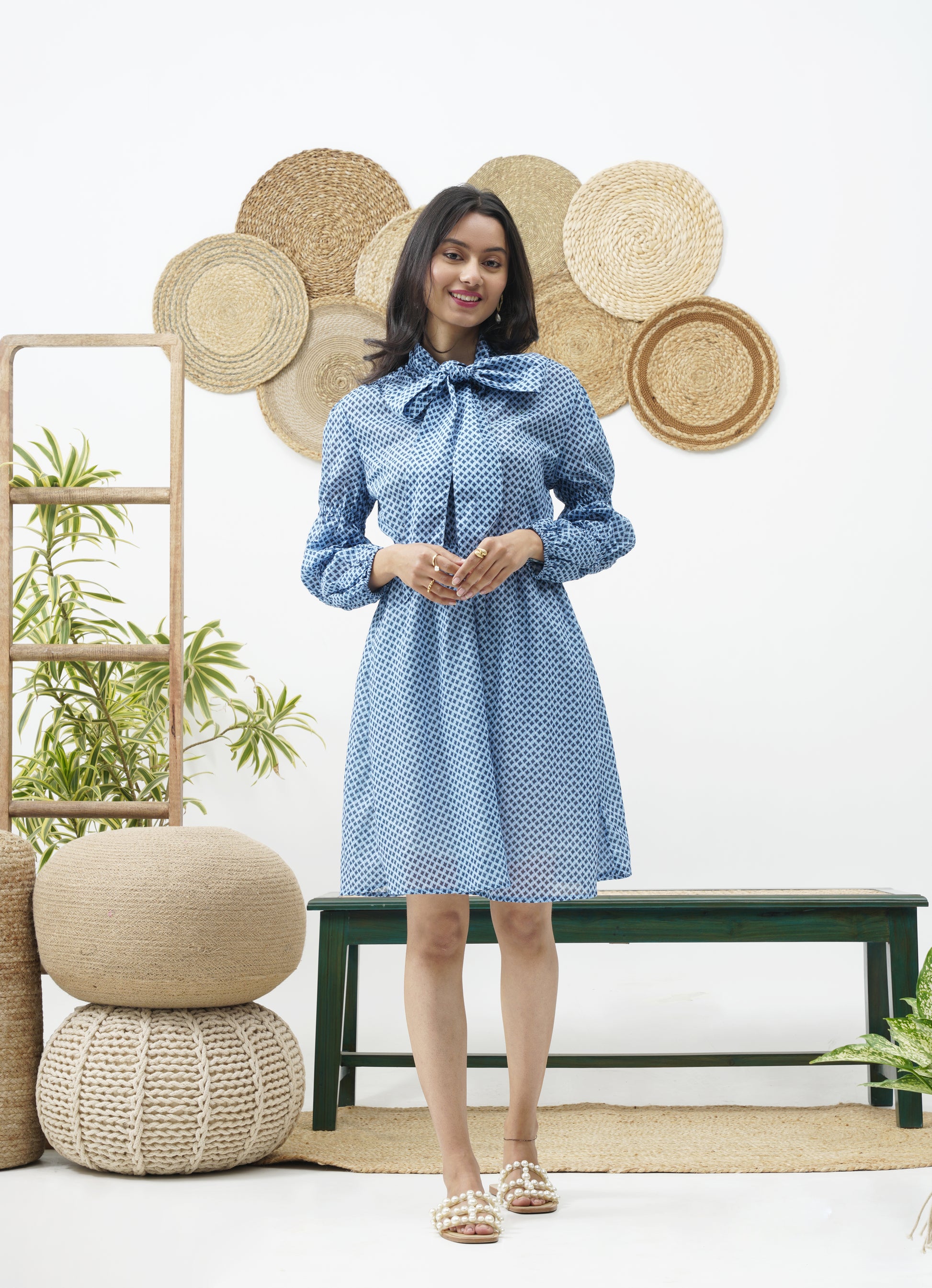 Neck tie detailing  Half Button fastening placket on the front  Tiered puff sleeves  Elasticated waist before falling into an A-line skirt.  vacations summer dress resort wear party casual wear relax 