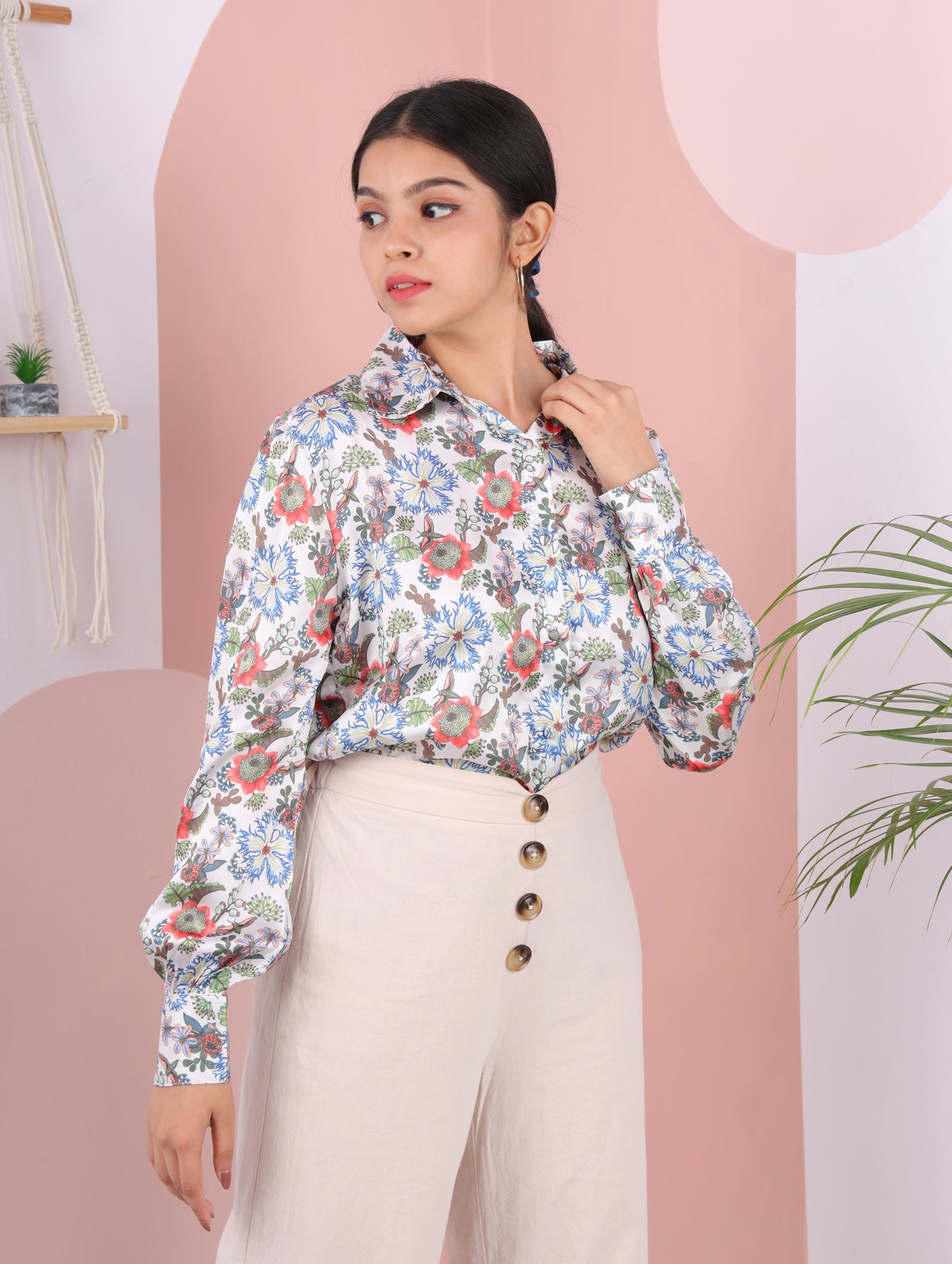 muticolour floral satin shirt . full sleeves spread collar fastens in the front with fabricated buttons.can wear from day to night