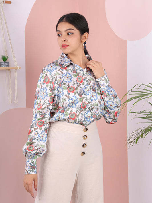 muticolour floral satin shirt . full sleeves spread collar fastens in the front with fabricated buttons.can wear from day to night